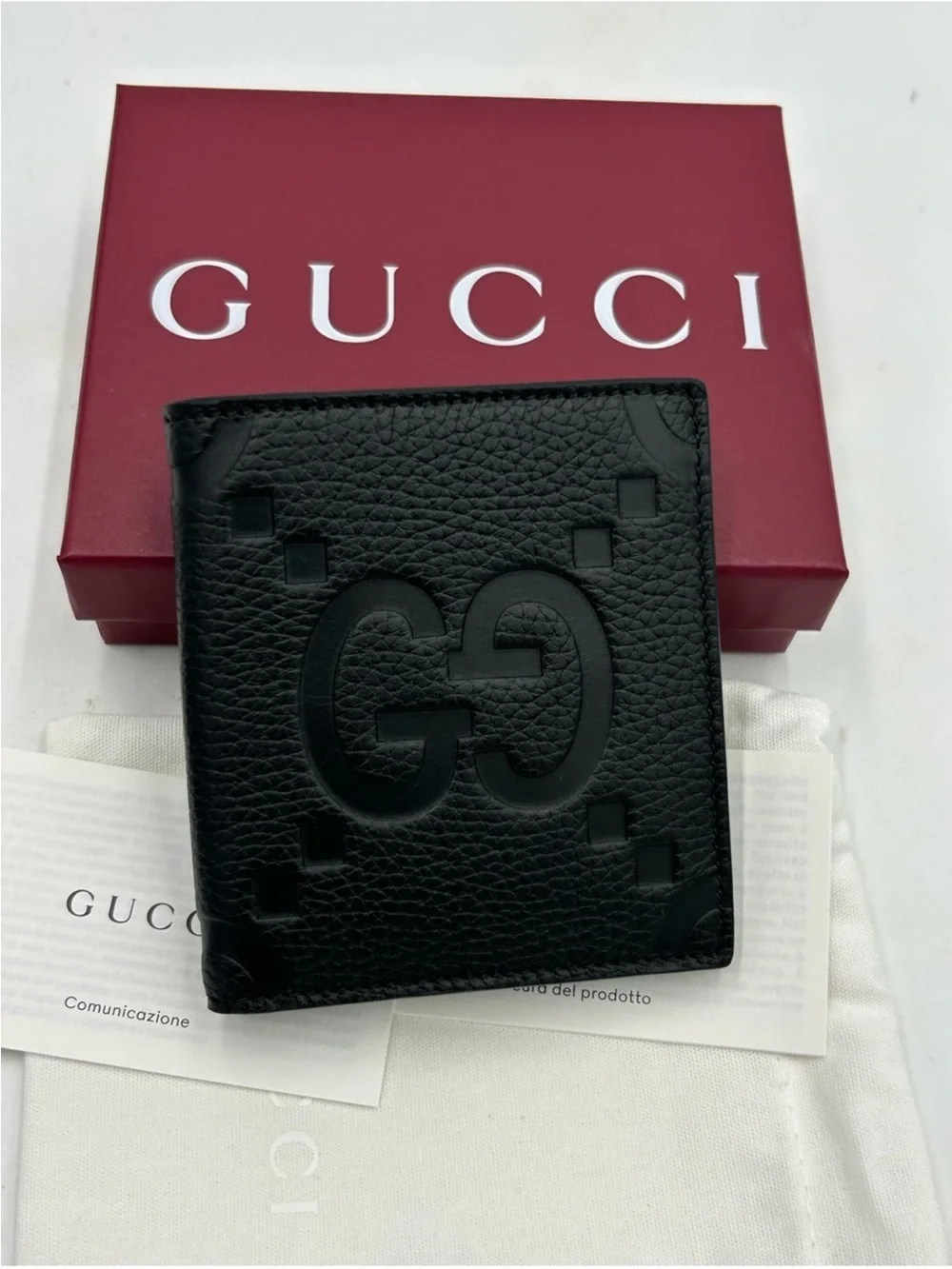 Men’s Gucci, jumbo GG leather bifold wallet made in Italy